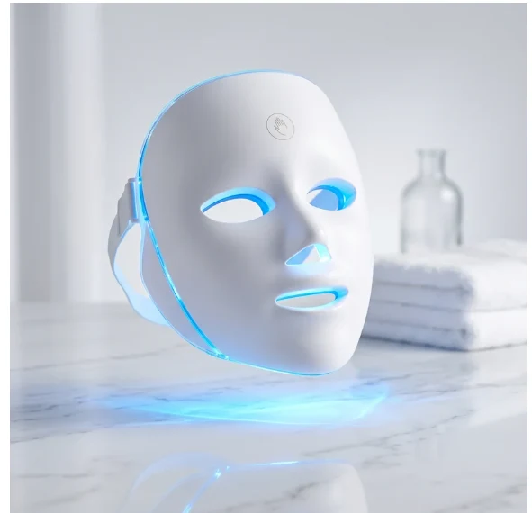 Product image creative of an LED light therapy face mask on a marble counter